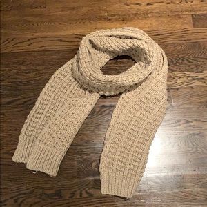 Soft beige knitted scarf